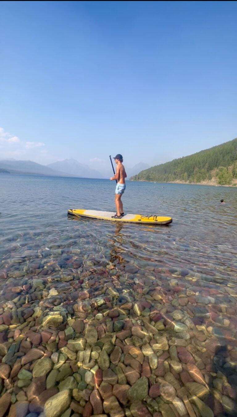 Paddle boarding Lake McDonald in Glacier National Park Montana