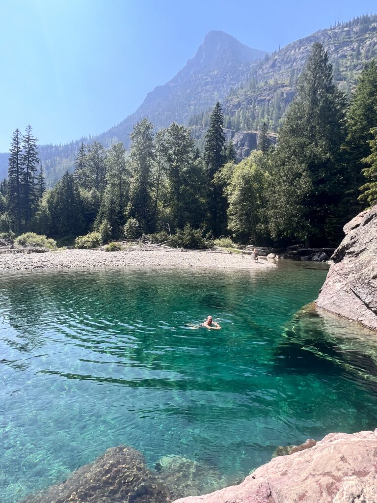 Swimming at Red Rock on Going To The Sun Road in Glacier National Park Montana