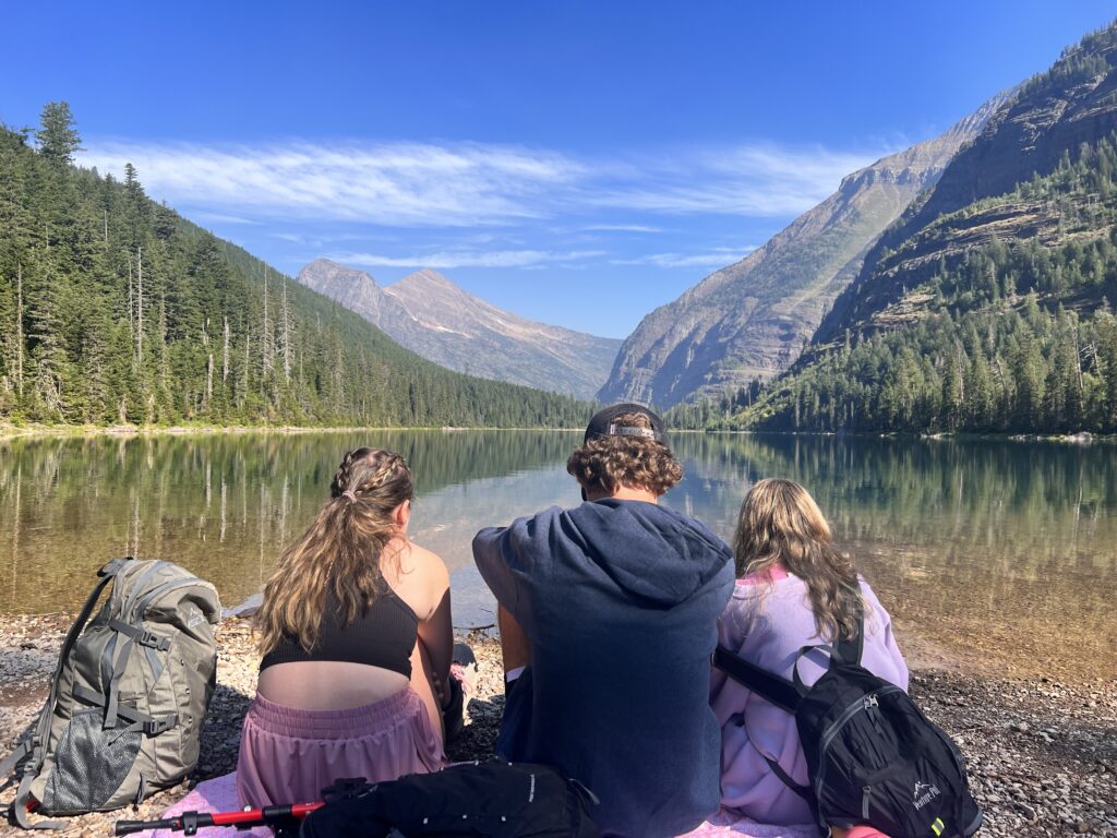 People looking at Avalanche Lake in Glacier National Park