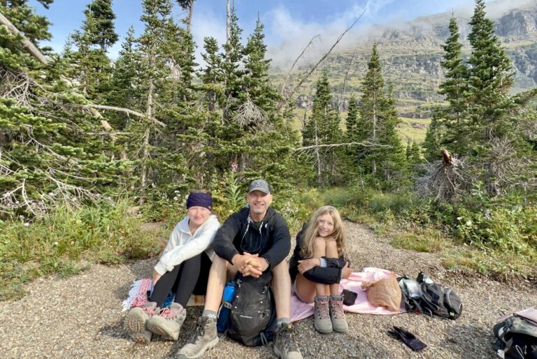 Hikers resting at beach at Hidden Lake