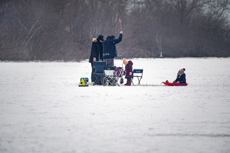 ice fishing on Deep Creek Lake in winter