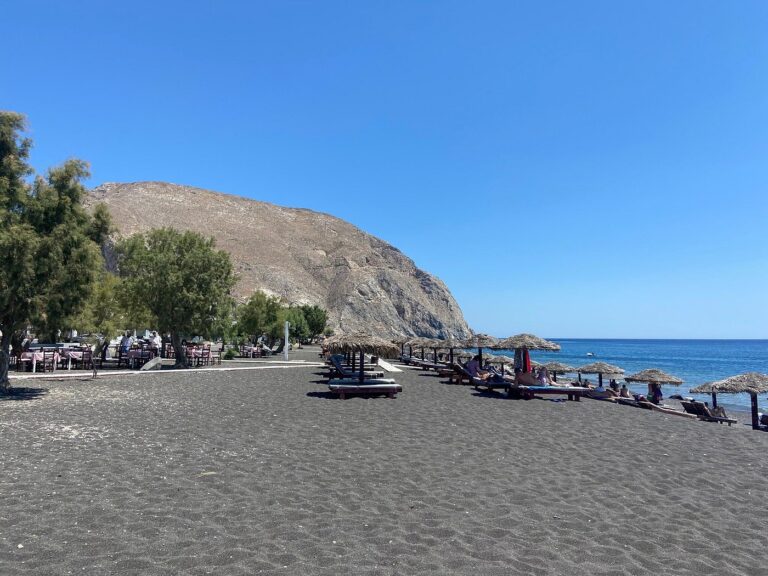 Perissa black sand beach in Santorini, Greece
