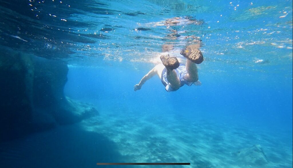 Snorkeling at White Beach in Santorini, Greece
