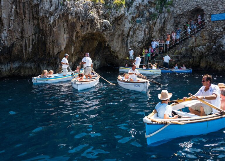 Rowboats waiting to enter the blue grotto in Capri, Italy